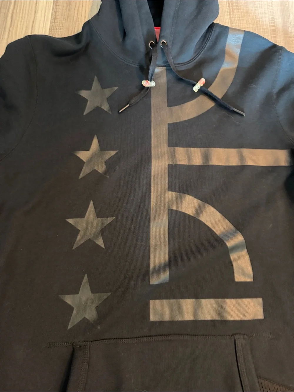 Nike Black Short-Sleeve Hooded Pullover with Matte Star & Stripe Graphic